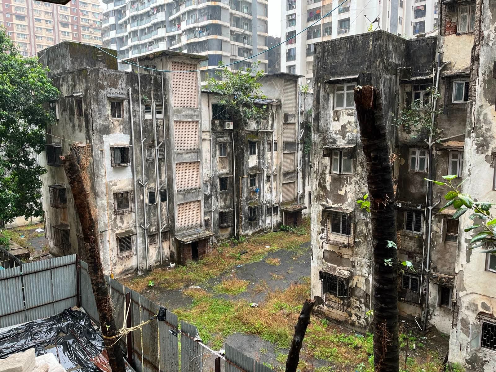 The Our Home site before redevelopment — an aging structure in Andheri West